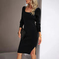 Woman wearing a sophisticated ribbed midi dress with a side slit, showcasing a sleek silhouette and elegant style