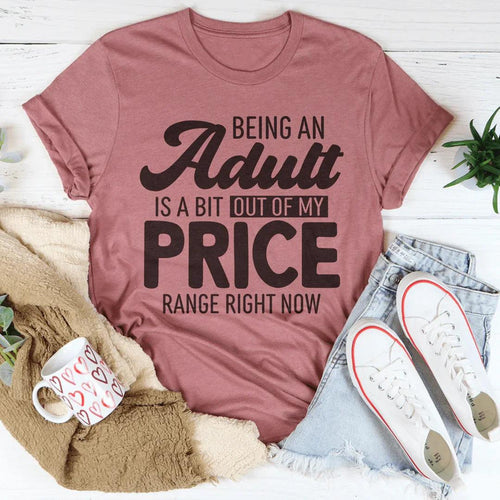 Woman wearing "Being an Adult Is a Bit Out of My Price Range Right Now" soft casual t-shirt