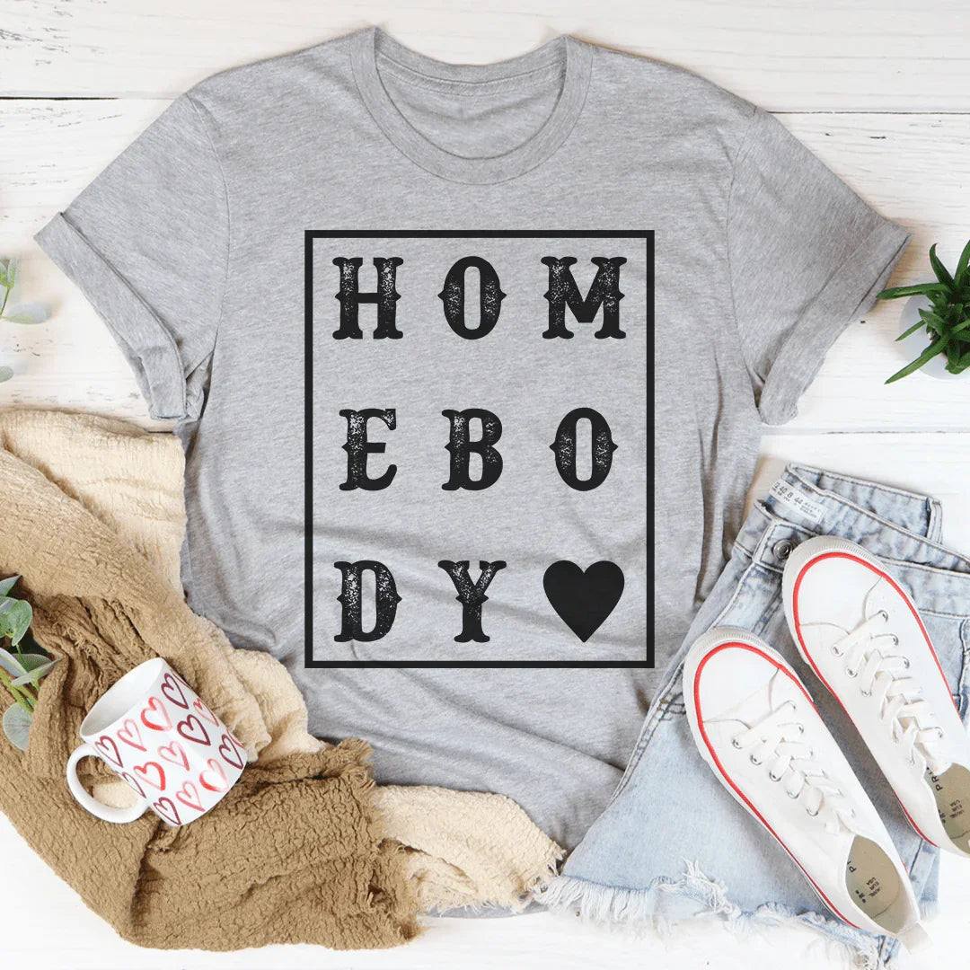 Soft peachy Homebody Heart Tee with heart design, perfect for casual wear