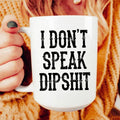White glossy 15oz ceramic mug with "I Don't Speak Dipshit" printed, durable and dishwasher safe