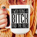 White high-gloss 15 oz ceramic Being A Btch mug with bold text, dishwasher and microwave safe