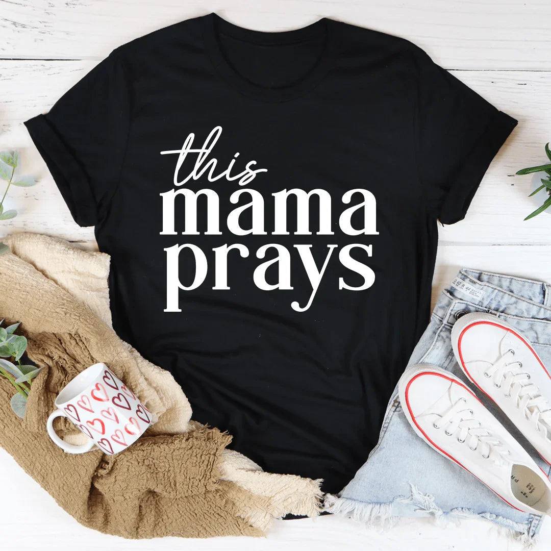 Woman wearing a soft, casual This Mama Prays tee, perfect for busy moms and prayer warriors